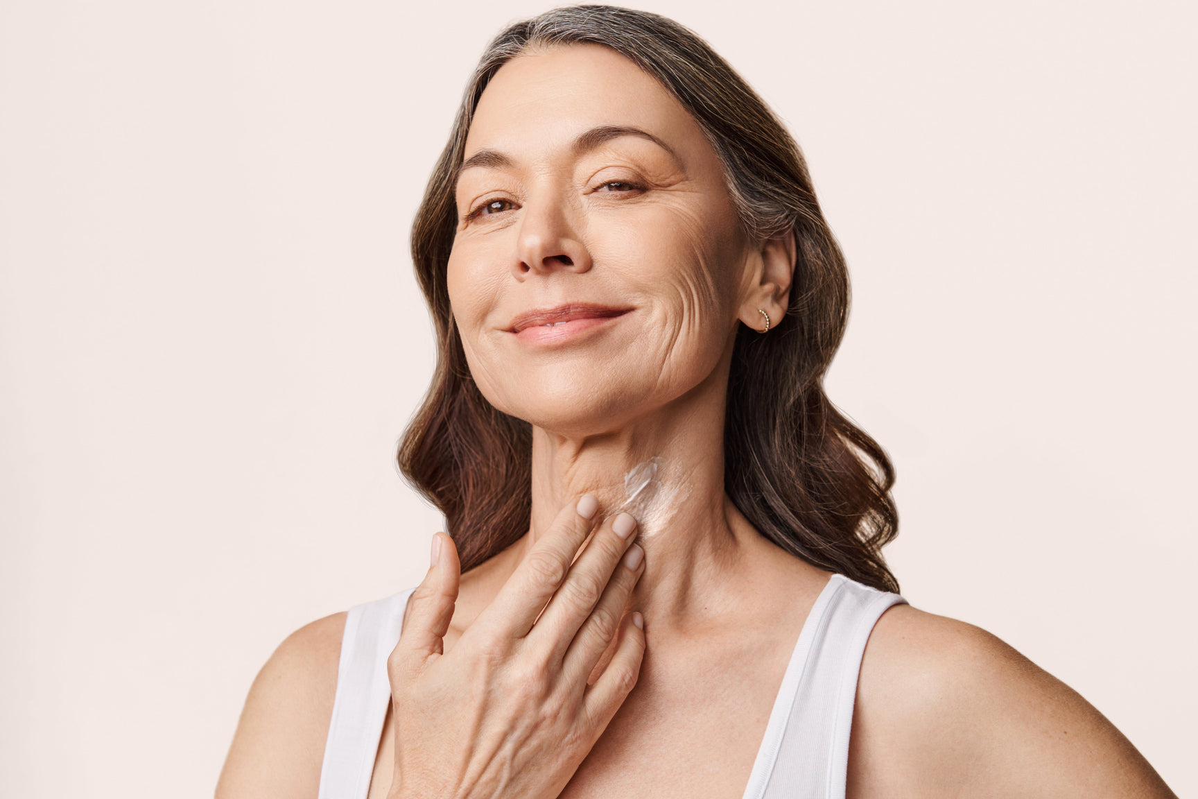 An image of a woman with jowls