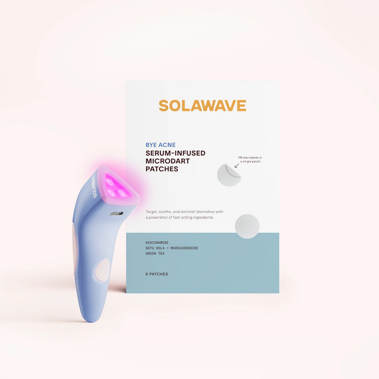 A SolaWave Bye Acne Pro Kit box stands upright beside a blue device with a glowing pink tip, showcasing advanced acne treatment and Blue & Red Light Therapies against a minimalist, light background.