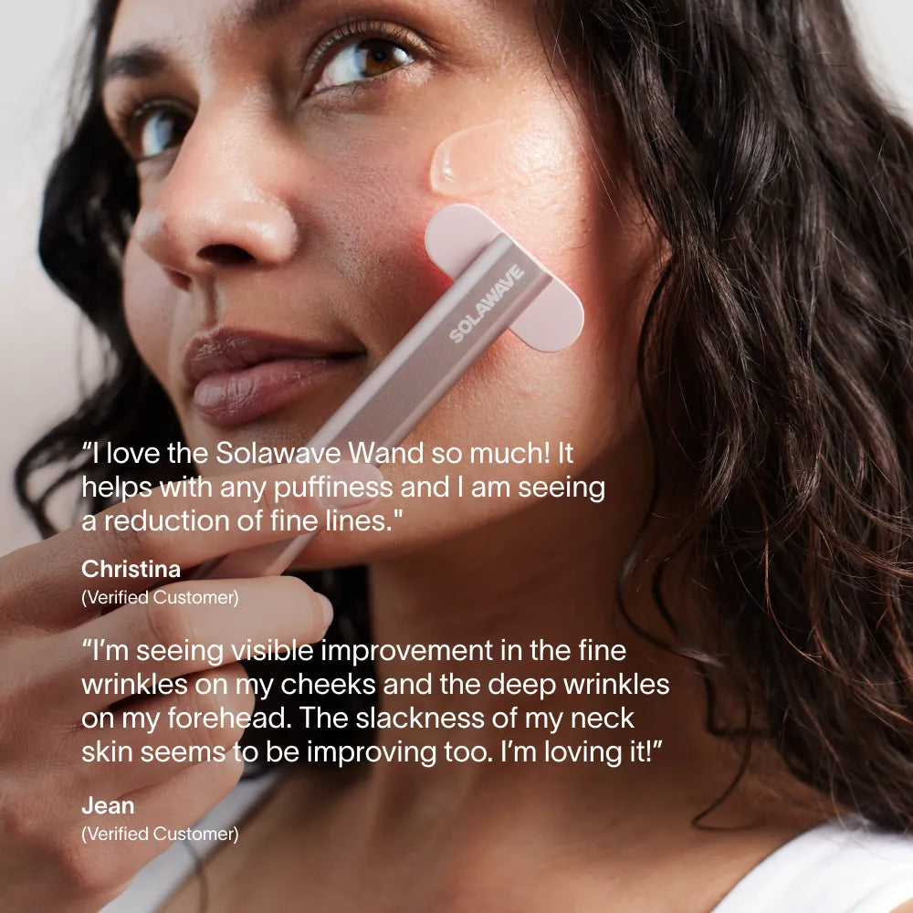 A woman uses the Solawave 4-in-1 Red Light Therapy Wand & Activating Serum Kit on her cheek, while glowing customer reviews about its effect on fine lines, dark spots, puffiness, and skin improvement appear in white text.