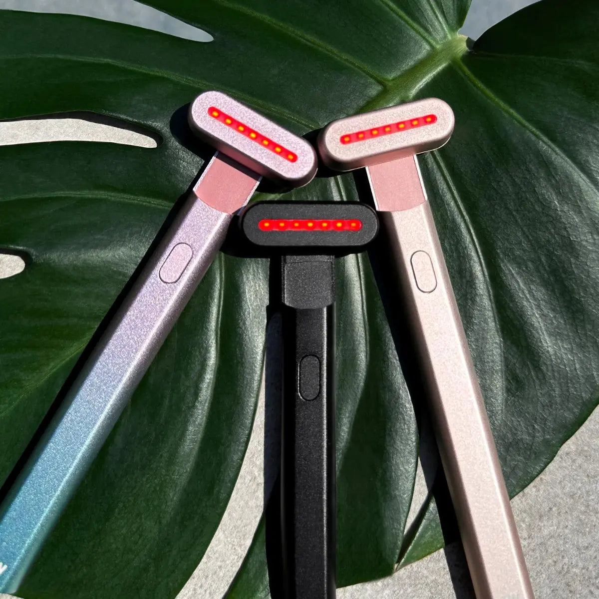 A product image with three Solawave red light therapy devices 