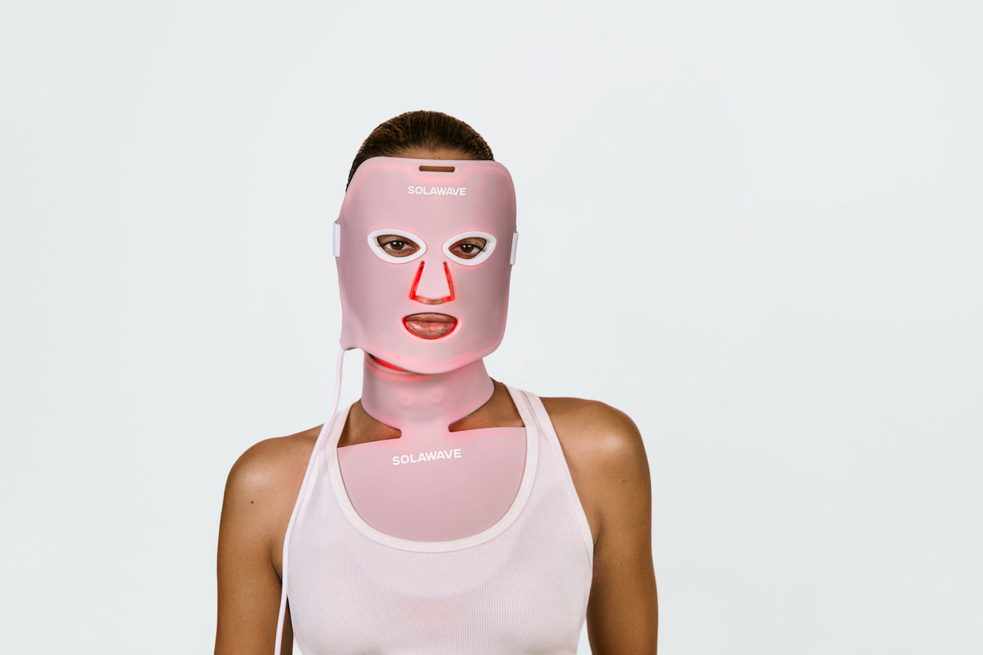 Solawave - An image of a woman wearing the best LED red light mask