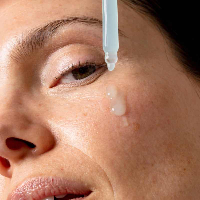 An image of a lady applying Solawave Renew Complex Activating Serum to her face || 30mL