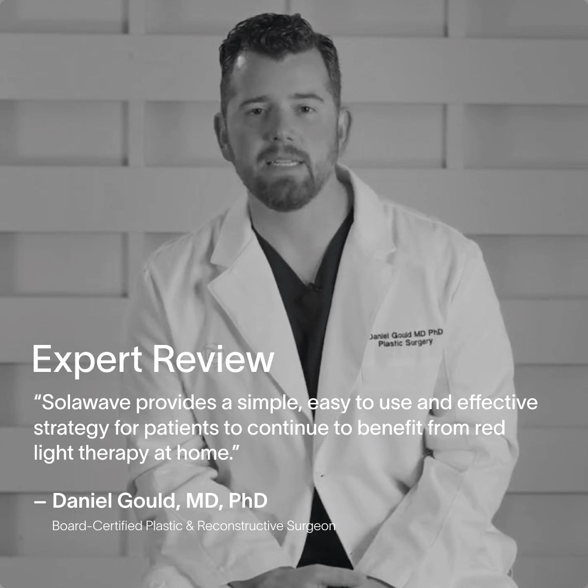A board-certified plastic and reconstructive surgeon in a white coat is seated against a textured wall beside a quote about the Solawave Neck & Chest LED Mask w/ LightBoost Cream Kit. Benefits like Red Light Therapy are highlighted, and the grayscale image gives it a timeless appeal. || Rose