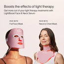 Two women are wearing Solawave skincare masks; one dons a full face mask and the other a neck and chest mask. They highlight the LightBoost Face & Neck Serum, enriched with growth factors, to boost light therapy effects for optimal skin renewal.