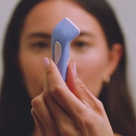Video showing overview of bye acne red and blue light therapy skincare kit including hydrating sheet masks. || Periwinkle