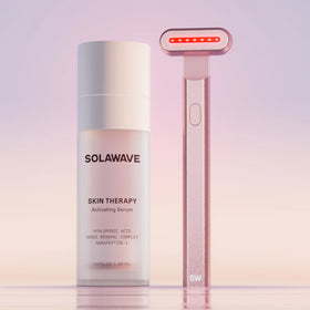 An image of the Solawave red light therapy wand with activating serum || Rose Gold