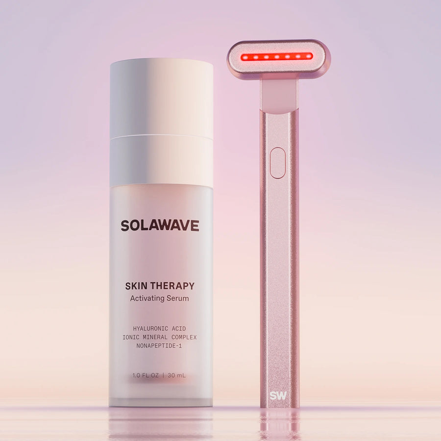 An image of the Solawave red light therapy wand with activating serum || Rose Gold