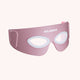 Solawave Radiant Renewal Eye Recovery Pro red light therapy eye mask in pink, with soft silicone eye cutouts.