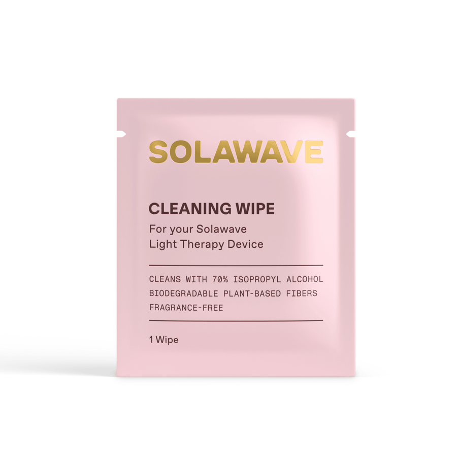 The Solawave Light Therapy Device Cleaning Wipes packet is pink, fragrance-free, contains one biodegradable plant-based wipe with 70% isopropyl alcohol, and is designed for use with light therapy devices.