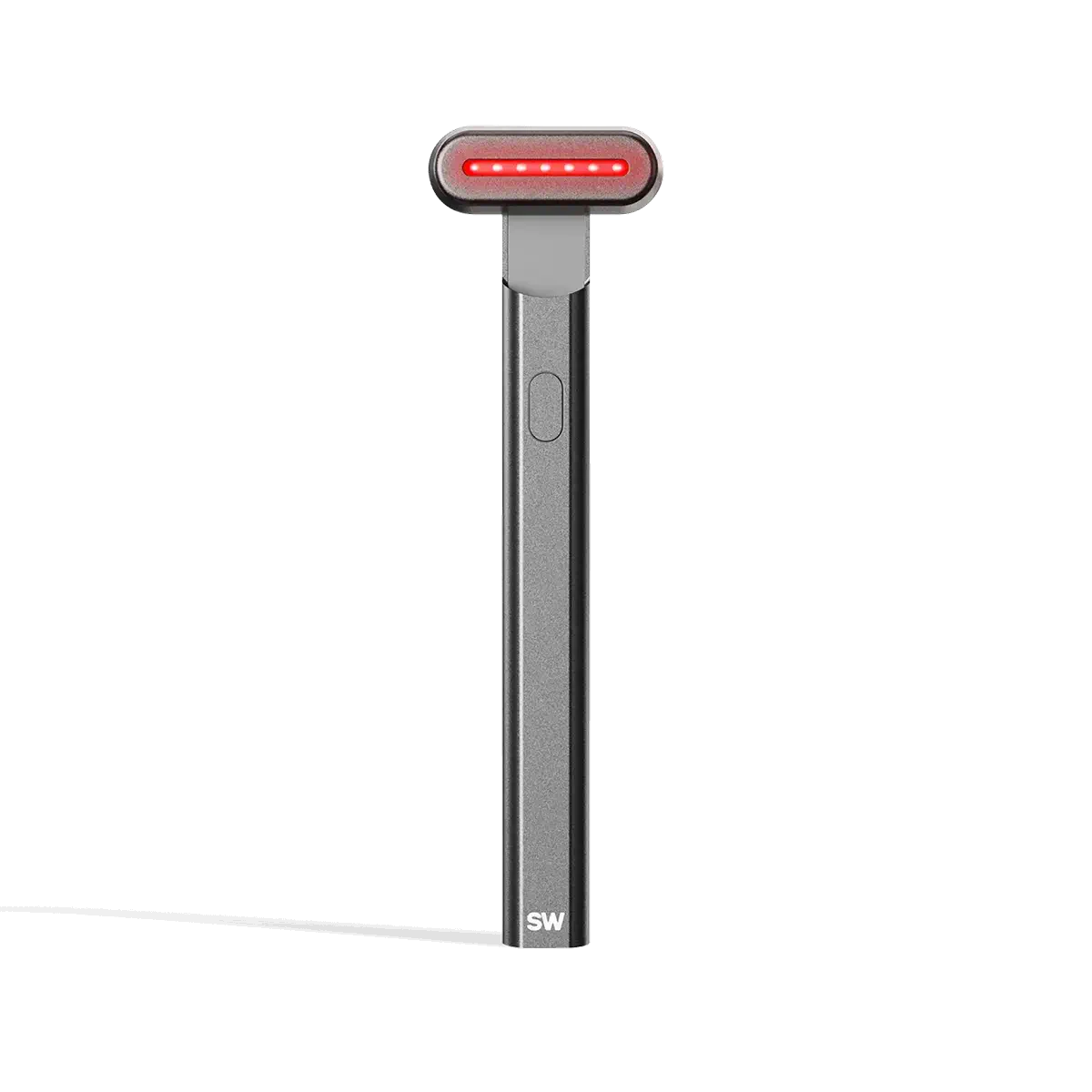4-in-1 Radiant Renewal Skincare Wand with Red Light Therapy - in charcoal features a minimalist design, flat rounded head, and red LED light to help reduce fine lines with advanced skincare tech and simple one-button control. || charcoal