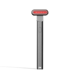 4-in-1 Radiant Renewal Skincare Wand with Red Light Therapy - in charcoal features a minimalist design, flat rounded head, and red LED light to help reduce fine lines with advanced skincare tech and simple one-button control. || charcoal