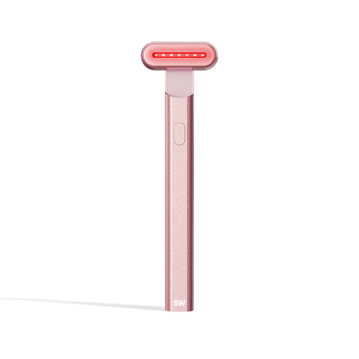 4-in-1 Radiant Renewal Skincare Wand with Red Light Therapy - in Rose Gold features a minimalist design, flat rounded head, and red LED light to help reduce fine lines with advanced skincare tech and simple one-button control. || Rose Gold