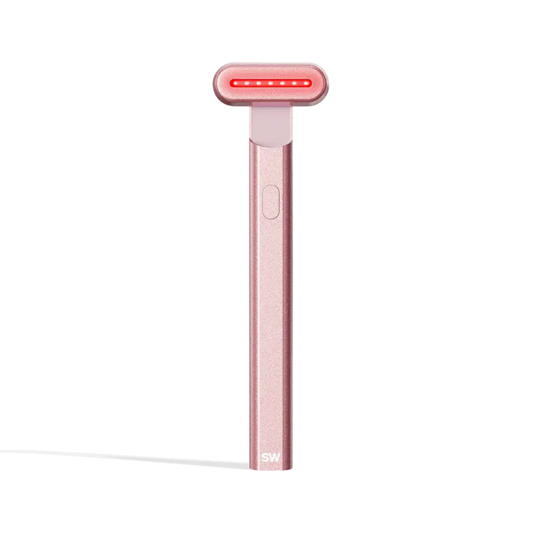 4-in-1 Radiant Renewal Skincare Wand with Red Light Therapy - in Rose Gold features a minimalist design, flat rounded head, and red LED light to help reduce fine lines with advanced skincare tech and simple one-button control. || Rose Gold